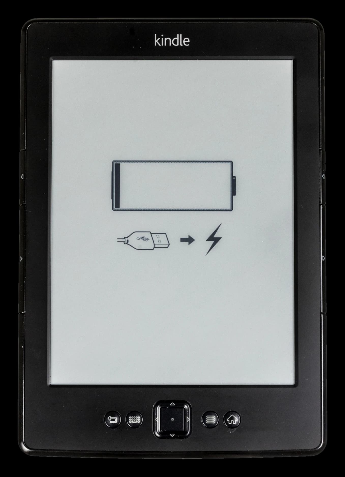 Black Kindle 4 e-reader, front, showing the low-battery screen